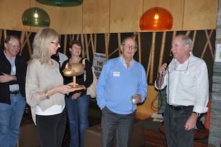 Anne-Maree Gale and Mike O'Reilly present Geoff Jones with the Gold Wood Duck